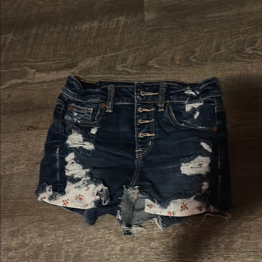 Distressed Denim Shorts with Floral Accents